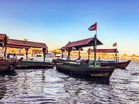 an abra crossing to the old city of Dubai