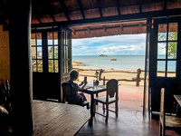 Susan's Story, Susan eating breakfast at the Makuzi Beach Resort