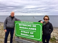 Photo from Susan's Story, Susan & Hugh posing by a sign at the Strait of Magellan