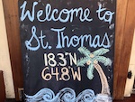 Photo from Susan's Story, a sign welcomes us to St. Thomas