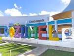 Photo from Susan's Story, me in front of the big Cozumel sign at the port