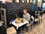 Photo from Susan's Story, Europe 2018, Susan ready to enjoy Steak & Frites in Paris