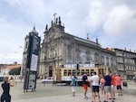 Photo from Susan's Story, Europe 2018, A trolley goes in front of a cathedral in Porto, Portugal