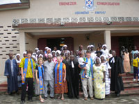 Photo from Susan's Story, our group and our hosts at the church