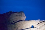 Susan's Story, the Crazy Horse carving in progress at night