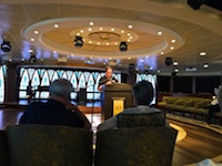 Photo from Susan's Story, Sunday Church service on Insignia led by cruise director Leslie Jon