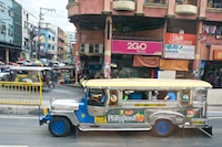Susan's Story, The main form of public transportation in Manila is the Jeepney, one of which is pictured here