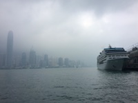 Photo from Susan's Story, The Insignia docked next to the Star Ferry in the TST section of Kowloon in the city of Hong Kong