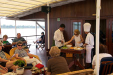 Susan's Story, cooking demonstration on our boat on the Mekong River