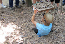 Susan's Story, Susan climbing down into one of the tunnels. She was the only one small enough to get in