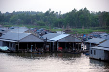 Photo from Susan's Story, a picture of a fish farm on the Mekong River
